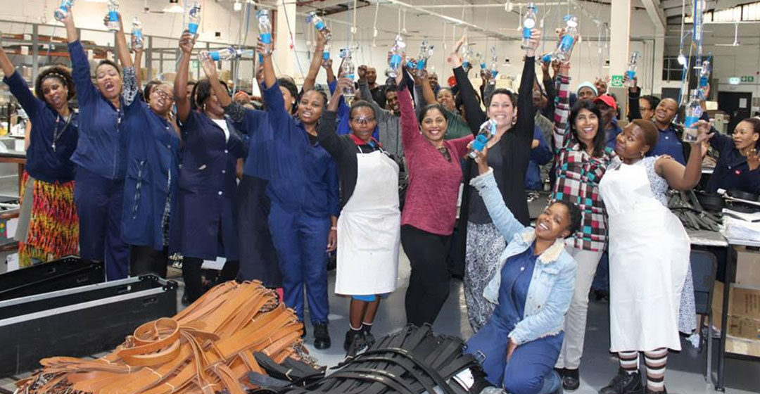 Happy Equator Staff with Their Glass Water Bottles in Aid of a Proudly “Plastic Free July”